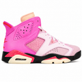 A pink and light pink high-top basketball sneaker with black and cream midsole accents, shown in a side profile on a white background.