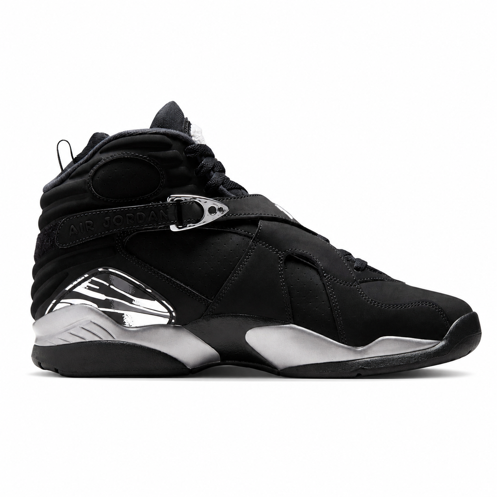 A black high-top Jordan sneaker with metallic silver accents on the midsole and heel, shown in a side profile view against a white background.
