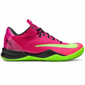 A Nike basketball shoe in vibrant pink and neon green, featuring a black midsole and black laces, shown from a side profile on a white background.